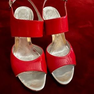 Red shiny heels with silver heel by Danton